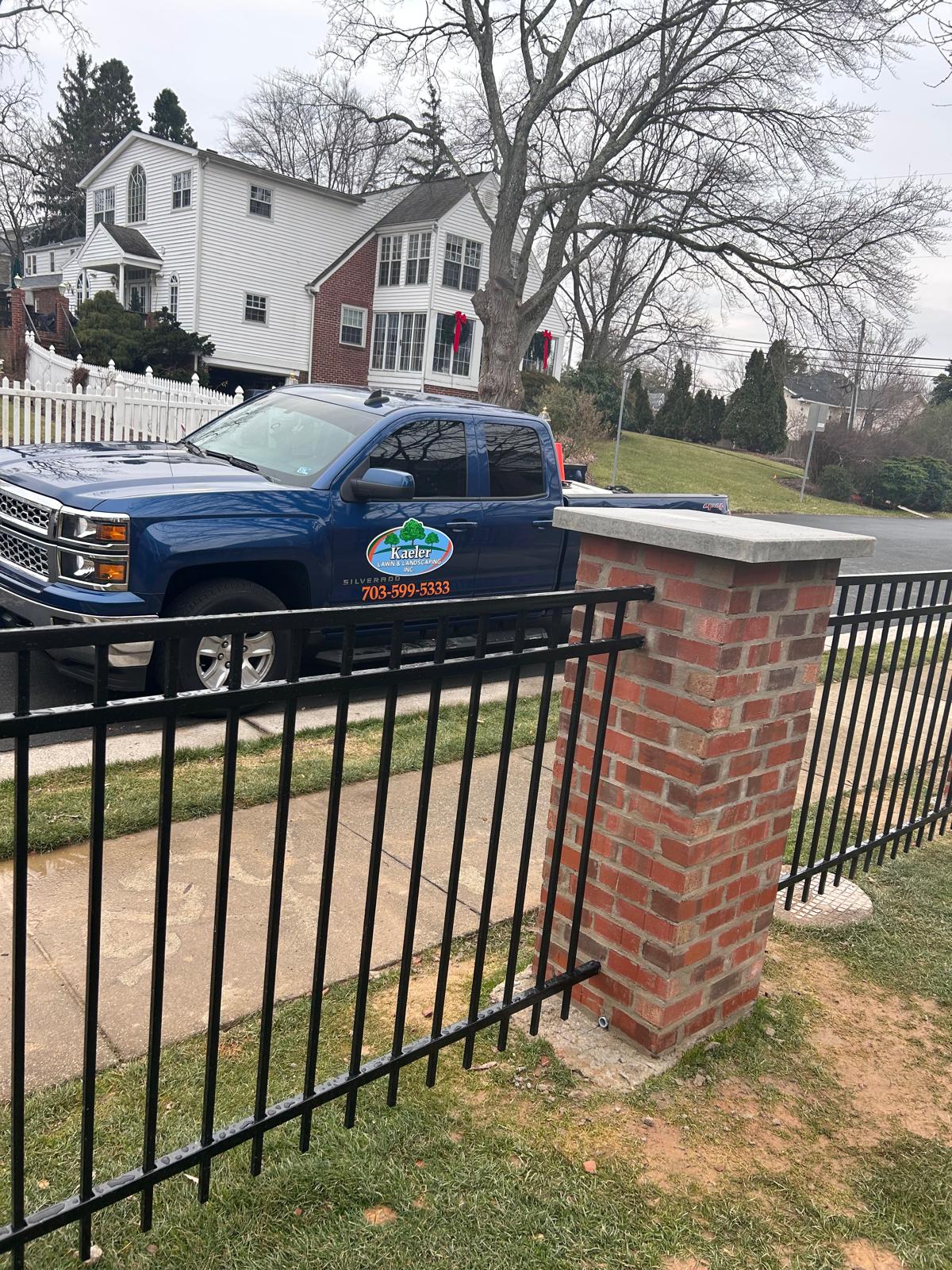 Kaeler truck at a job among bare late-autumn trees in Northern Virginia